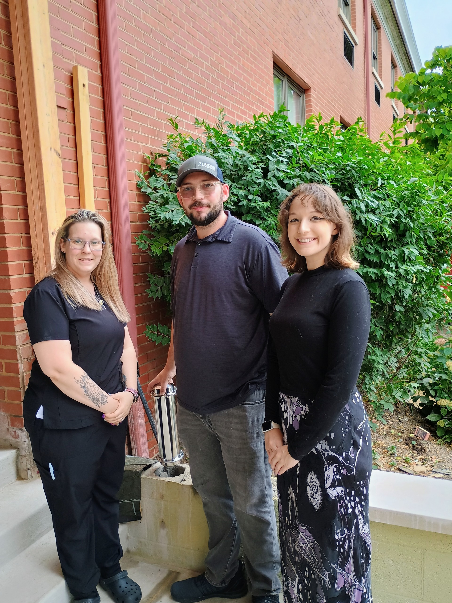 Staff places time capsule at Presbyterian Village